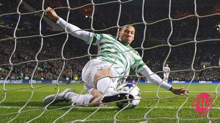 Celtic's Kevin Wilson clears a shot off the line from Juventus' Alessandro Matri (unseen) during their Champions League soccer match at Celtic Park stadium in Glasgow, Scotland February 12, 2013. REUTERS/David Moir (BRITAIN - Tags: SPORT SOCCER)